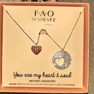 FAO Schwarz Fine Silver Played and Cubic Zirconia Heart Necklace Set